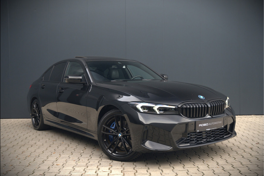 BMW 3-serie 320e High Executive M Sport | Panoramadak | Harman Kardon | Carbon | Camera | Adaptive LED | Stoelverwarming | Stuurverwarming | Apple Carplay | Navigatie | Cruise Control | Memory Seat | Trekhaak | Keyless | Shadowline