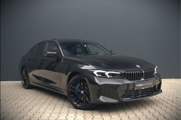 BMW 3-serie 320e High Executive M Sport | Panoramadak | Harman Kardon | Carbon | Camera | Adaptive LED | Stoelverwarming | Stuurverwarming | Apple Carplay | Navigatie | Cruise Control | Memory Seat | Trekhaak | Keyless | Shadowline