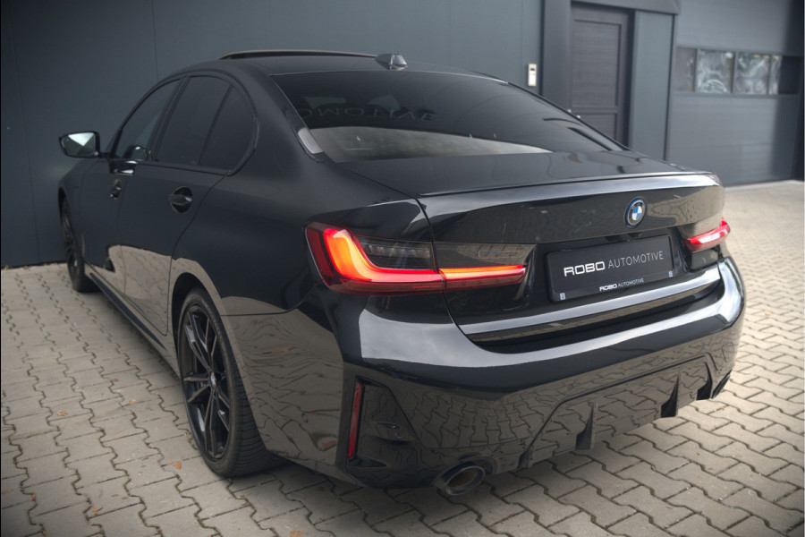BMW 3-serie 320e High Executive M Sport | Panoramadak | Harman Kardon | Carbon | Camera | Adaptive LED | Stoelverwarming | Stuurverwarming | Apple Carplay | Navigatie | Cruise Control | Memory Seat | Trekhaak | Keyless | Shadowline