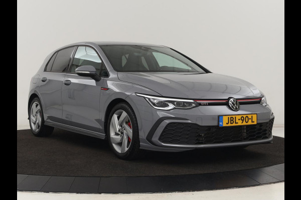 Volkswagen Golf 2.0 TSI GTI | Carplay | Sfeerverlichting | LED Plus | Sportstoelen | Parkeerhulp | Cruise control | Digital Cockpit | Climate control Volkswagen Golf 2.0 TSI GTI | Carplay | Sfeerverlichting | LED Plus | Sportstoelen | Parkeerhulp | Cruise control | Digital Cockpit | Climate control