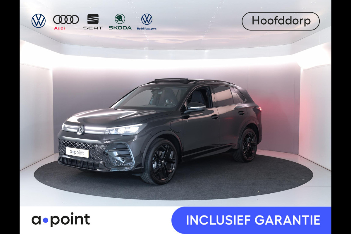 Volkswagen Tiguan 1.5 eHybrid R-Line Edition 272 PK PHEV | Verlengde garantie | Panorama dak | Trekhaak | Black Style | Matrix koplampen | Assistance pakket plus | Volkswagen Tiguan 1.5 eHybrid R-Line Edition 272 PK PHEV | Verlengde garantie | Panorama dak | Trekhaak | Black Style | Matrix koplampen | Assistance pakket plus |