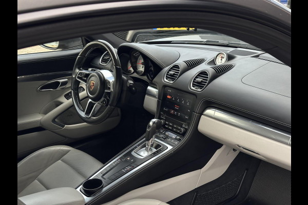 Porsche 718 Cayman 2.0 Sportchrono Adapt. Cruise BOSE Stuurverw. CarPlay Keyless LED 20”LM Agaatgrijs