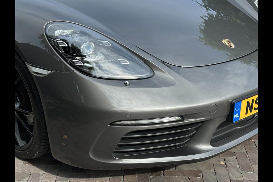Porsche 718 Cayman 2.0 Sportchrono Adapt. Cruise BOSE Stuurverw. CarPlay Keyless LED 20”LM Agaatgrijs