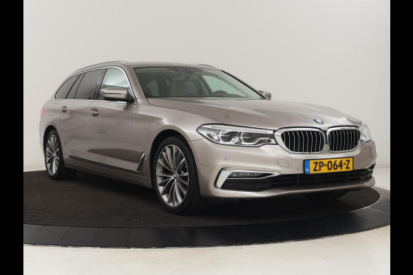 BMW 5 Serie 520i High Executive | Luxury Line | Leder | Trekhaak | Camera | Stoelverwarming | 19'' | Sfeerverlichting | Memory | Carplay | Navigatie | Park Assist | Full LED