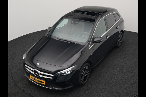 Mercedes-Benz B-Klasse 250 e Progressive Plug In Hybrid 218pk PHEV | Panodak | Multibeam LED | Widescreen | Adaptive Cruise | Sportstoelen Verwarmd | Stuur Verwarmd | Blis | Sfeerverlichting | Apple Carplay | Navigatie | Keyless | DAB |
