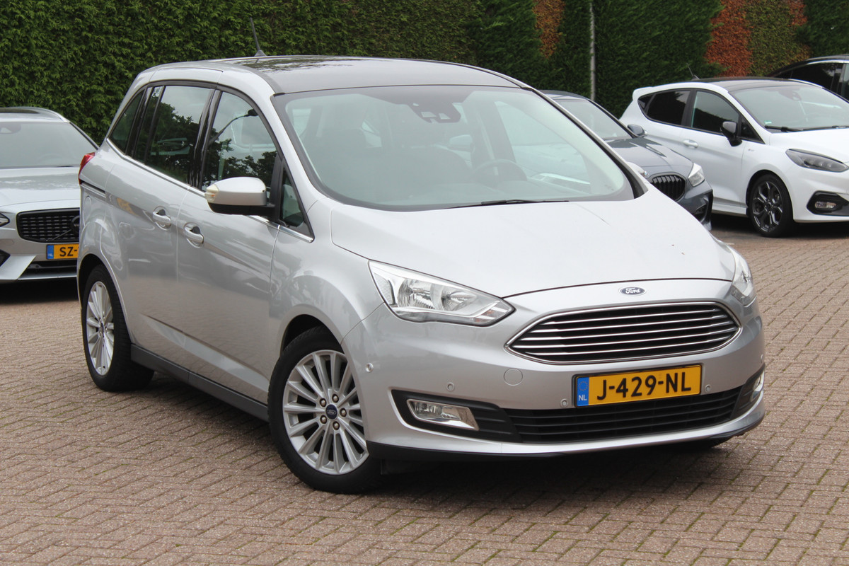 Ford Grand C-Max 1.0 Titanium 7p. / Panoramadak / Camera / Navigatie / 17'' / Parkeerhulp V+A / Cruise Control Ford Grand C-Max 1.0 Titanium 7p. / Panoramadak / Camera / Navigatie / 17'' / Parkeerhulp V+A / Cruise Control