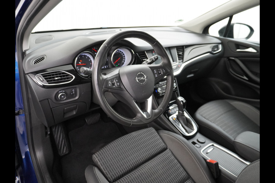 Opel Astra Sports Tourer 1.4T 145pk Navi Camera Lane-dep. Keyless 1/2Leer CruiseControl Led Bluetooth Pdc Apple/Android Aut.Verlichting Isofix Elek.Ramen Ecc Tel. Usb 16''LM Business Elegance