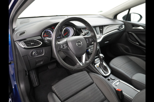 Opel Astra Sports Tourer 1.4T 145pk Navi Camera Lane-dep. Keyless 1/2Leer CruiseControl Led Bluetooth Pdc Apple/Android Aut.Verlichting Isofix Elek.Ramen Ecc Tel. Usb 16''LM Business Elegance