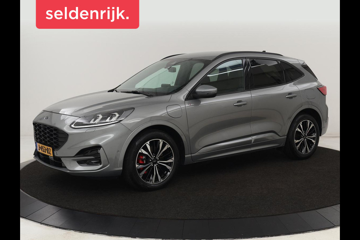 Ford Kuga 2.5 PHEV ST-Line X | Head-Up | Stoelverwarming | Adaptive cruise | 360 Camera | B&O Sound | Leder/Alcantara | Carplay | Achterbankverwarming | Navigatie | Keyless | Full LED | Digital Cockpit | Plug In Ford Kuga 2.5 PHEV ST-Line X | Head-Up | Stoelverwarming | Adaptive cruise | 360 Camera | B&O Sound | Leder/Alcantara | Carplay | Achterbankverwarming | Navigatie | Keyless | Full LED | Digital Cockpit | Plug In