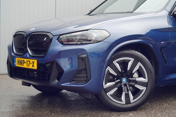 BMW iX3 High Executive Edition 80 kWh / M-Sport / 7.058 KM! / Pano / Leder / Incl. BTW / Camera / Navigatie / Stoelverw.