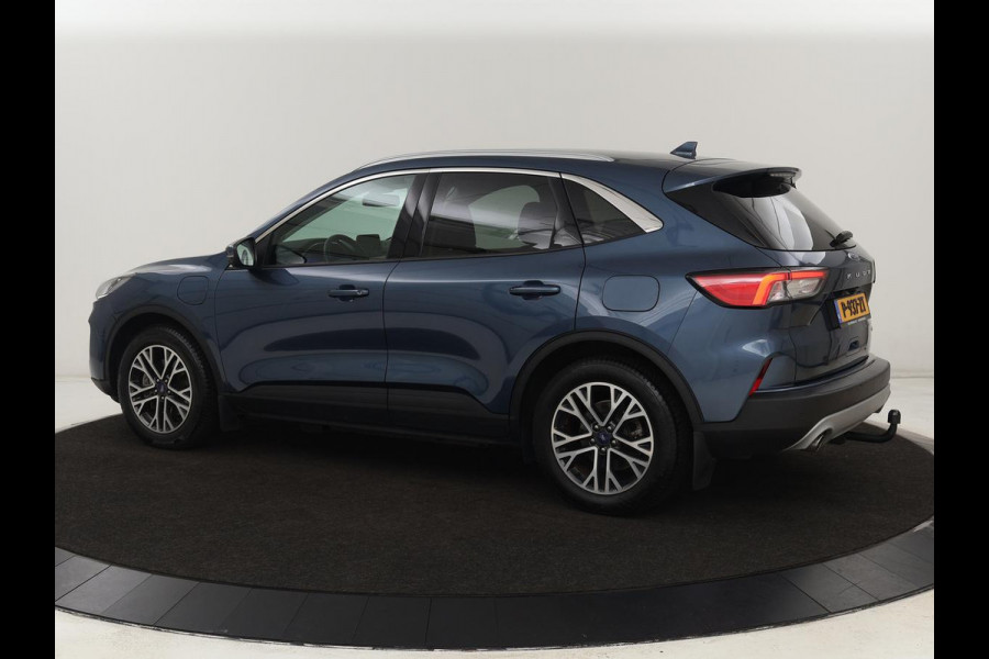 Ford Kuga 2.5 PHEV Titanium X | Trekhaak | Stoelverwarming | Camera | Carplay | Half leder | Achterbankverwarming | Navigatie | Full LED | Climate control | Parkeerhulp | Keyless | B&O Sound | Plug In