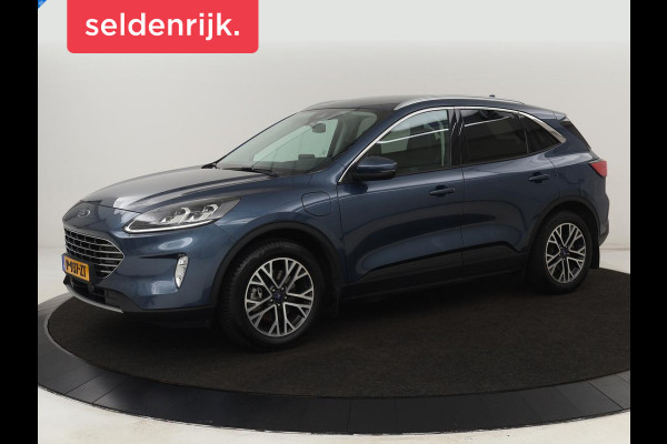 Ford Kuga 2.5 PHEV Titanium X | Trekhaak | Stoelverwarming | Camera | Carplay | Half leder | Achterbankverwarming | Navigatie | Full LED | Climate control | Parkeerhulp | Keyless | B&O Sound | Plug In