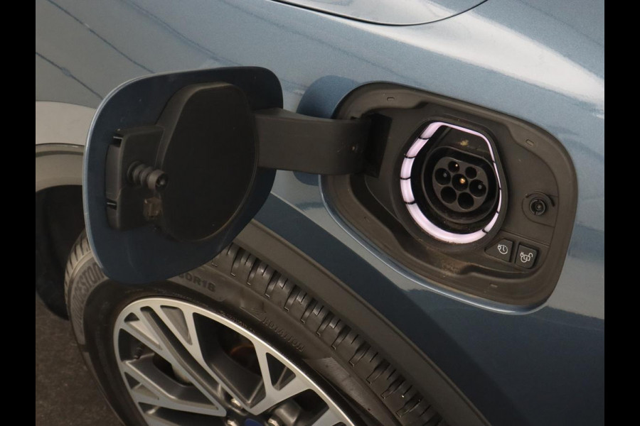 Ford Kuga 2.5 PHEV Titanium X | Trekhaak | Stoelverwarming | Camera | Carplay | Half leder | Achterbankverwarming | Navigatie | Full LED | Climate control | Parkeerhulp | Keyless | B&O Sound | Plug In