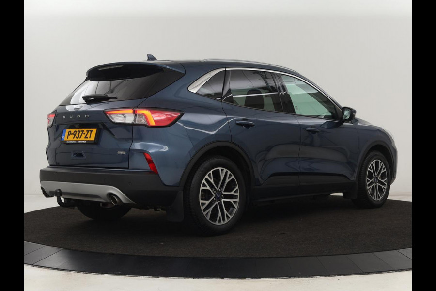 Ford Kuga 2.5 PHEV Titanium X | Trekhaak | Stoelverwarming | Camera | Carplay | Half leder | Achterbankverwarming | Navigatie | Full LED | Climate control | Parkeerhulp | Keyless | B&O Sound | Plug In