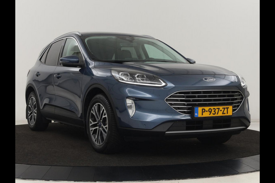Ford Kuga 2.5 PHEV Titanium X | Trekhaak | Stoelverwarming | Camera | Carplay | Half leder | Achterbankverwarming | Navigatie | Full LED | Climate control | Parkeerhulp | Keyless | B&O Sound | Plug In