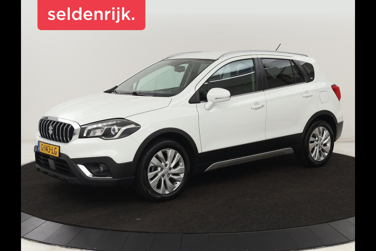 Suzuki S-Cross 1.0 Boosterjet Exclusive | Stoelverwarming | Trekhaak | Camera | Navigatie | MirrorLink | Full LED | Climate control | Cruise control Suzuki S-Cross 1.0 Boosterjet Exclusive | Stoelverwarming | Trekhaak | Camera | Navigatie | MirrorLink | Full LED | Climate control | Cruise control