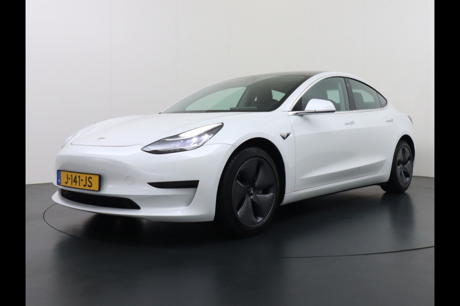 Tesla Model 3 RWD SR+ 60kWh 325PK SOH=85% LMV  AutoPilot Leder PanoDak Adaptive-Cruise Lmv Camera's Elektr.-Stuur+Stoelen+Spiegels+Geheugen+Ea Navi LED Comfortstoelen ACC DAB Voorverwarmen interieur via App Keyless via Telefoonsleutel One-Pedal-Drive Origineel Nederlandse auto tot 11kw laden thuis! 1.584kg licht!