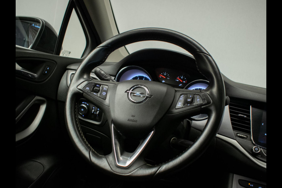 Opel Astra 1.0 Online Edition Sport (APPLE CARPLAY, GROOT NAVI, PARKEERSENSOREN, LED, CRUISE, SPORTSTOELEN, NETTE STAAT)