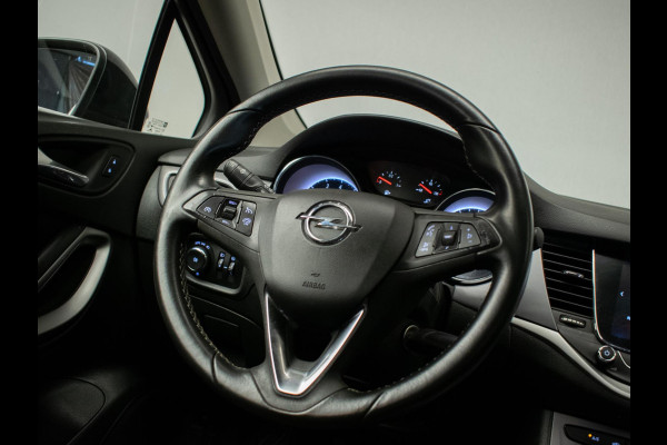 Opel Astra 1.0 Online Edition Sport (APPLE CARPLAY, GROOT NAVI, PARKEERSENSOREN, LED, CRUISE, SPORTSTOELEN, NETTE STAAT)