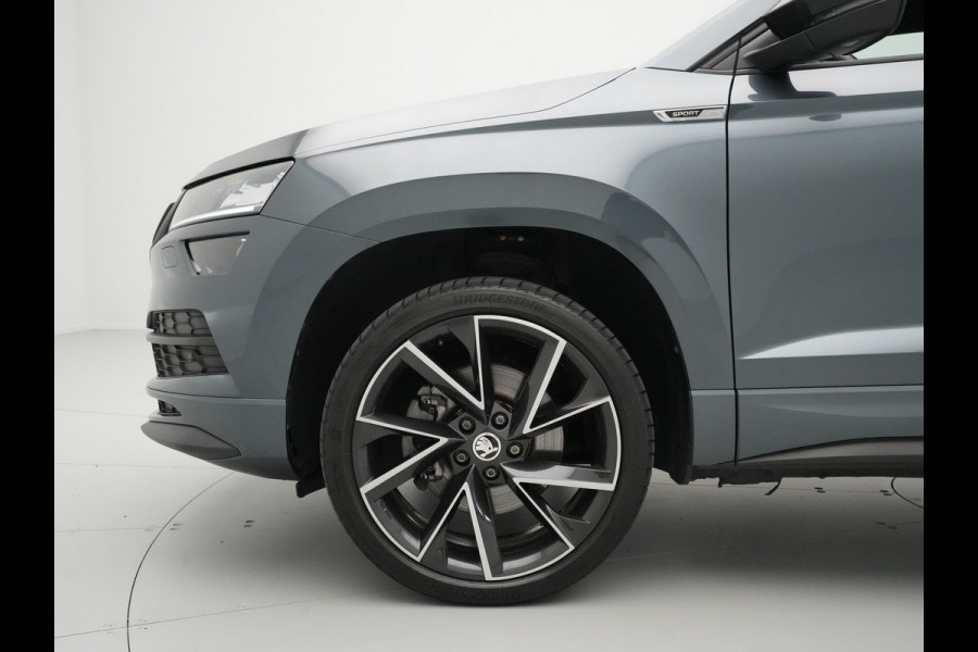 Škoda Karoq 1.5 TSI 150pk DSG Sportline Business Leer Panorama dak Trekhaak Canton