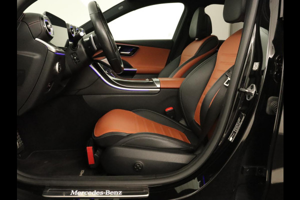 Mercedes-Benz C-Klasse 300e AMG Line | Panoramadak | Trekhaak | 360 Camera | Leder | Stoelverwarming | Adaptive cruise | Memory | Sfeerverlichting | PHEV | Plug In