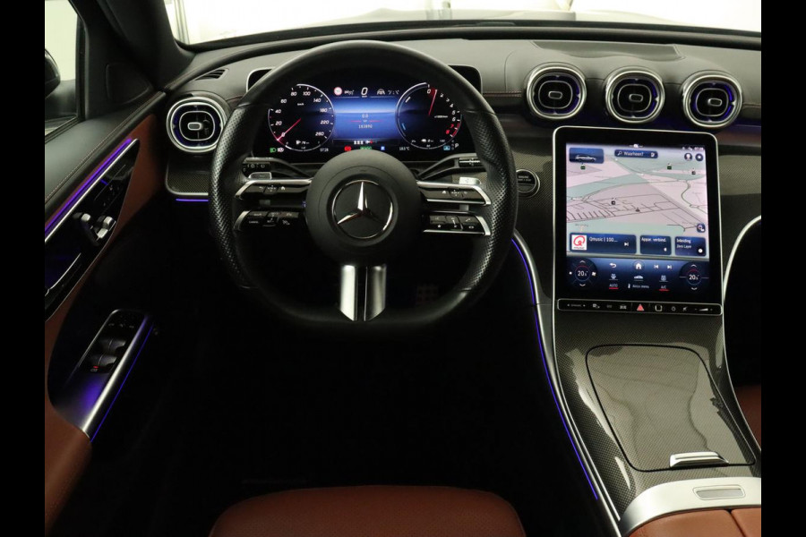 Mercedes-Benz C-Klasse 300e AMG Line | Panoramadak | Trekhaak | 360 Camera | Leder | Stoelverwarming | Adaptive cruise | Memory | Sfeerverlichting | PHEV | Plug In
