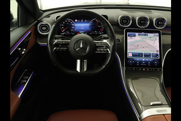 Mercedes-Benz C-Klasse 300e AMG Line | Panoramadak | Trekhaak | 360 Camera | Leder | Stoelverwarming | Adaptive cruise | Memory | Sfeerverlichting | PHEV | Plug In