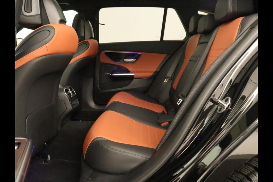 Mercedes-Benz C-Klasse 300e AMG Line | Panoramadak | Trekhaak | 360 Camera | Leder | Stoelverwarming | Adaptive cruise | Memory | Sfeerverlichting | PHEV | Plug In