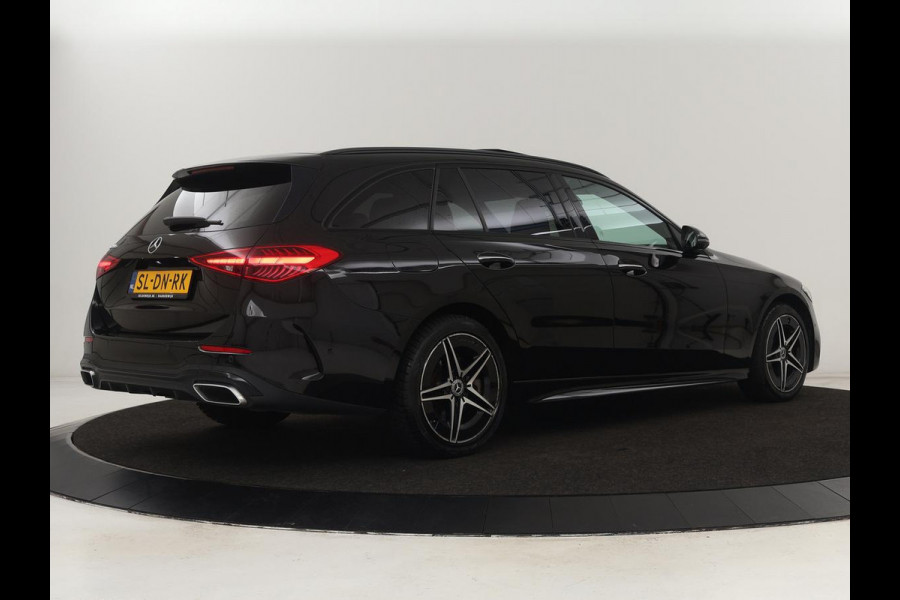 Mercedes-Benz C-Klasse 300e AMG Line | Panoramadak | Trekhaak | 360 Camera | Leder | Stoelverwarming | Adaptive cruise | Memory | Sfeerverlichting | PHEV | Plug In