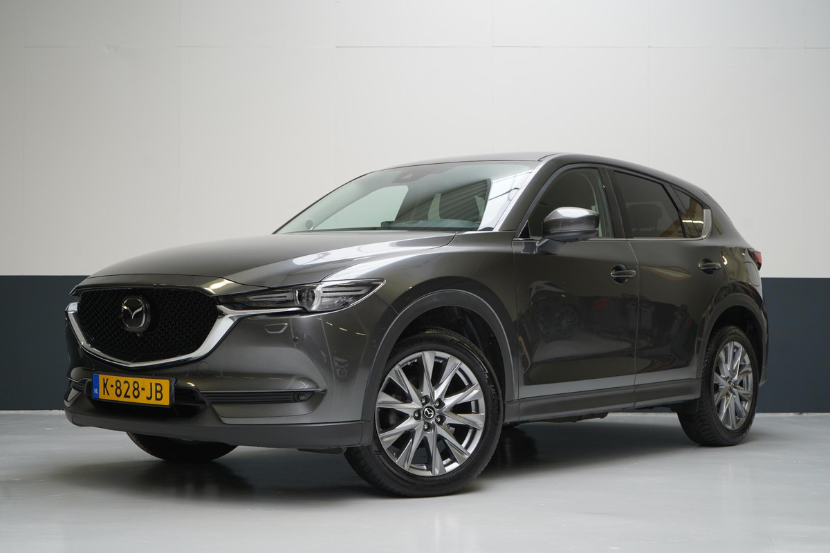 Mazda CX-5 2.0 SkyActiv-G 165 Luxury | Leder | Memory | Stoelverwarming | Stuurverwarming Mazda CX-5 2.0 SkyActiv-G 165 Luxury | Leder | Memory | Stoelverwarming | Stuurverwarming