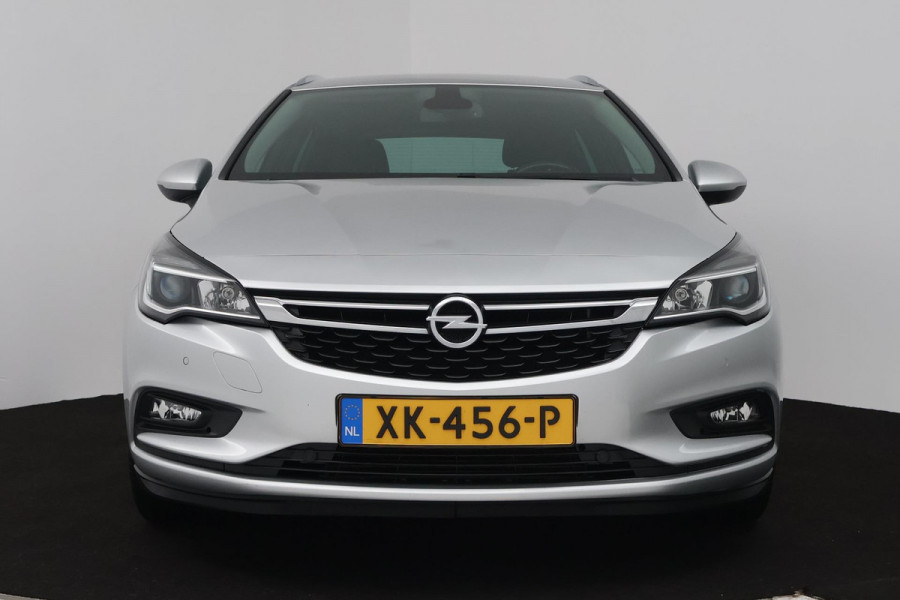 Opel Astra Sports Tourer 1.4 Turbo Online Edition (TREKHAAK, STOELVERWARMING, PARKEERSENSOREN, NAVIGATIE, CRUISE CONTROL)