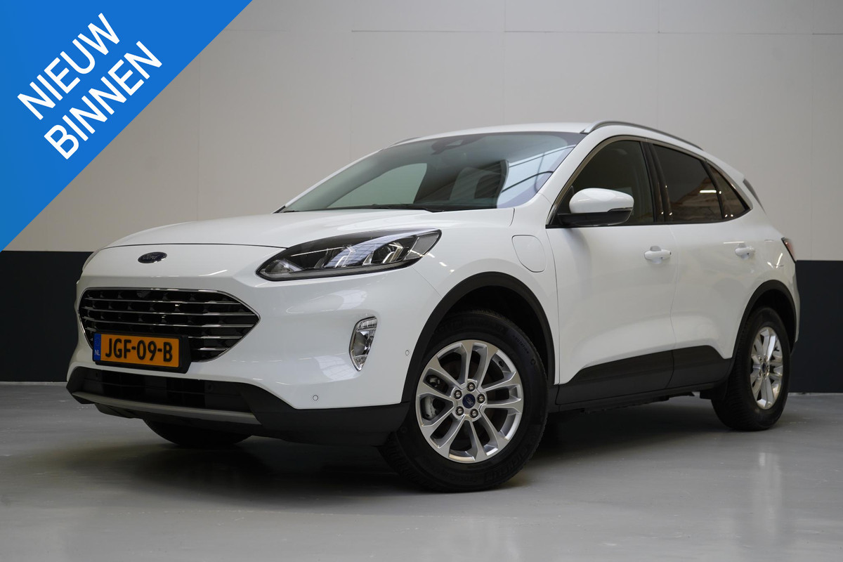 Ford Kuga 2.5 PHEV Titanium | Adapt. Cruise | Voorruitverwarming | Privacy Glass | Navigatie | Climate airco Ford Kuga 2.5 PHEV Titanium | Adapt. Cruise | Voorruitverwarming | Privacy Glass | Navigatie | Climate airco