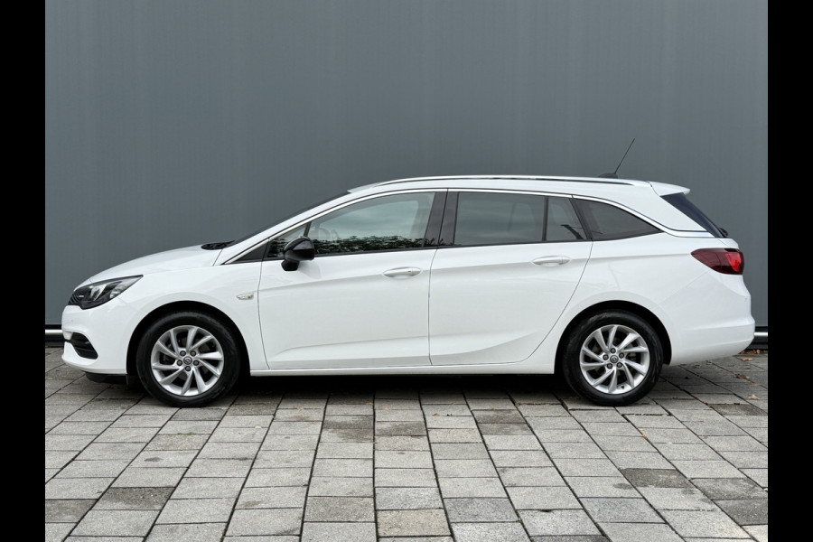 Opel Astra Sports Tourer BWJ 2021 | 1.2T 131PK Bus Elegance | NWE APK | CLIMA | LED | NAVI | CAMERA A | LEDER/STOF | SPORTSTOELEN | CRUISE | CARPLAY
