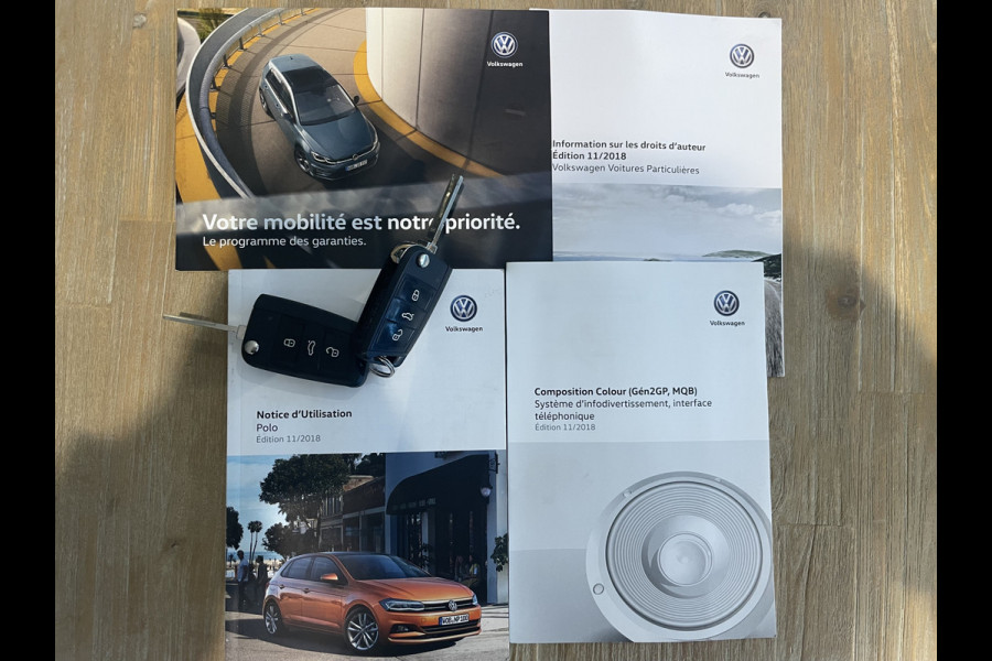 Volkswagen Polo 1.0 TSI Comfortline Business Airco - Cruise control - Bluetooth - Mistlampen voor  - Navigatie full map - Radio/ CD speler - Start/ stop systeem - Stuur multifunctioneel