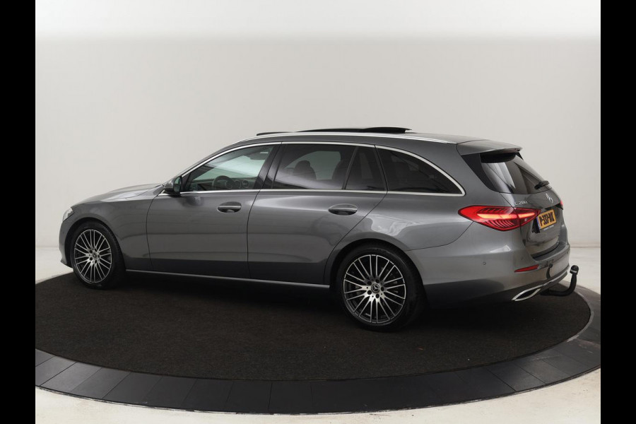 Mercedes-Benz C-Klasse 200 Launch Edition Luxury Line | Panoramadak | Trekhaak | Leder | Stoelverwarming | Carplay | Camera | Sfeerverlichting | Navigatie | 18'' | Getint glas