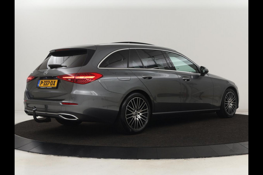 Mercedes-Benz C-Klasse 200 Launch Edition Luxury Line | Panoramadak | Trekhaak | Leder | Stoelverwarming | Carplay | Camera | Sfeerverlichting | Navigatie | 18'' | Getint glas