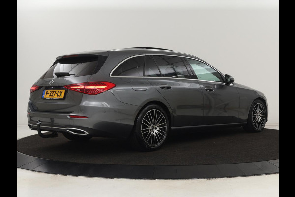 Mercedes-Benz C-Klasse 200 Launch Edition Luxury Line | Panoramadak | Trekhaak | Leder | Stoelverwarming | Carplay | Camera | Sfeerverlichting | Navigatie | 18'' | Getint glas