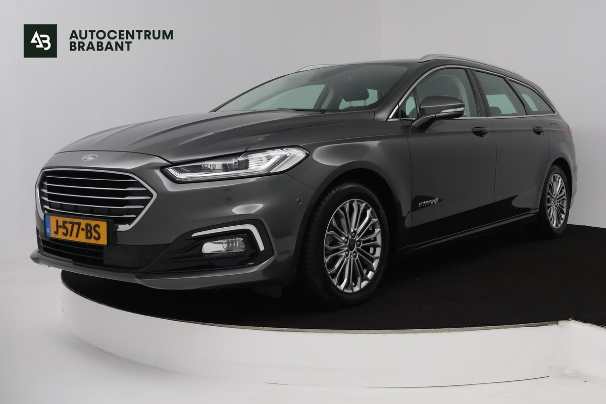 Ford Mondeo Wagon 2.0 IVCT HEV Titanium (STOELVERWARMING, ACHTERUITRIJCAMERA, NAVIGATIE, PARKEERSENSOREN, CRUISE CONTROL) Ford Mondeo Wagon 2.0 IVCT HEV Titanium (STOELVERWARMING, ACHTERUITRIJCAMERA, NAVIGATIE, PARKEERSENSOREN, CRUISE CONTROL)