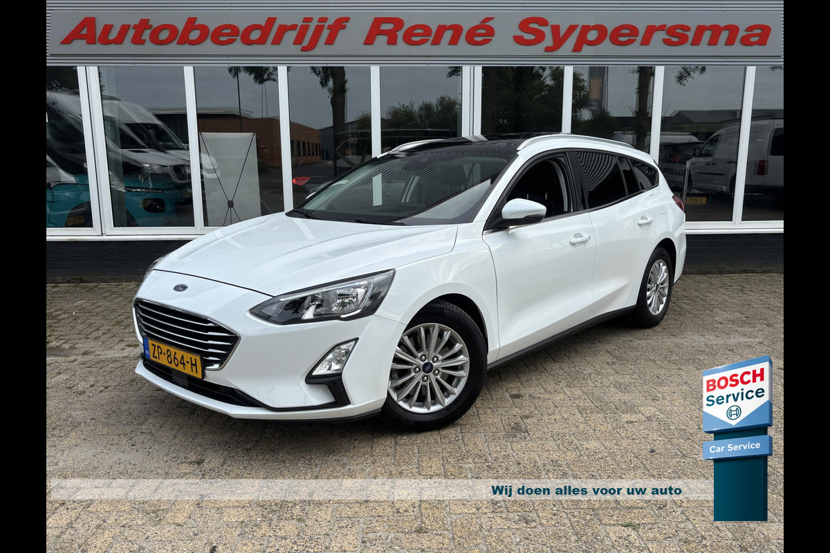 Ford FOCUS Wagon 1.0 EcoBoost Titanium Panodak | Stoel |Stuur Verwarming | Topstaat! Ford FOCUS Wagon 1.0 EcoBoost Titanium Panodak | Stoel |Stuur Verwarming | Topstaat!