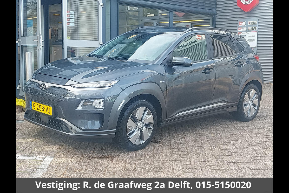 Hyundai Kona EV Premium 64 kWh | Navigatie | Schuif-/Kanteldak | 1e eigenaar | Camera | Hyundai Kona EV Premium 64 kWh | Navigatie | Schuif-/Kanteldak | 1e eigenaar | Camera |