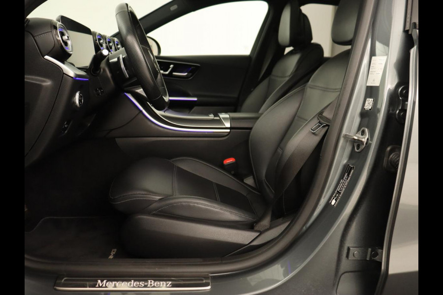 Mercedes-Benz C-Klasse 300 e AMG Line | Panoramadak | Wegklapbare trekhaak | Sfeerverlichting | Elektrische stoelen | Stoelverwarming | 360 Camera | Leder | Memory | Carplay