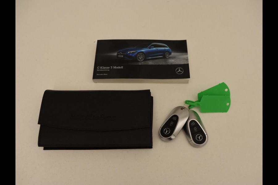 Mercedes-Benz C-Klasse 300 e AMG Line | Panoramadak | Wegklapbare trekhaak | Sfeerverlichting | Elektrische stoelen | Stoelverwarming | 360 Camera | Leder | Memory | Carplay