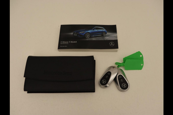 Mercedes-Benz C-Klasse 300 e AMG Line | Panoramadak | Wegklapbare trekhaak | Sfeerverlichting | Elektrische stoelen | Stoelverwarming | 360 Camera | Leder | Memory | Carplay