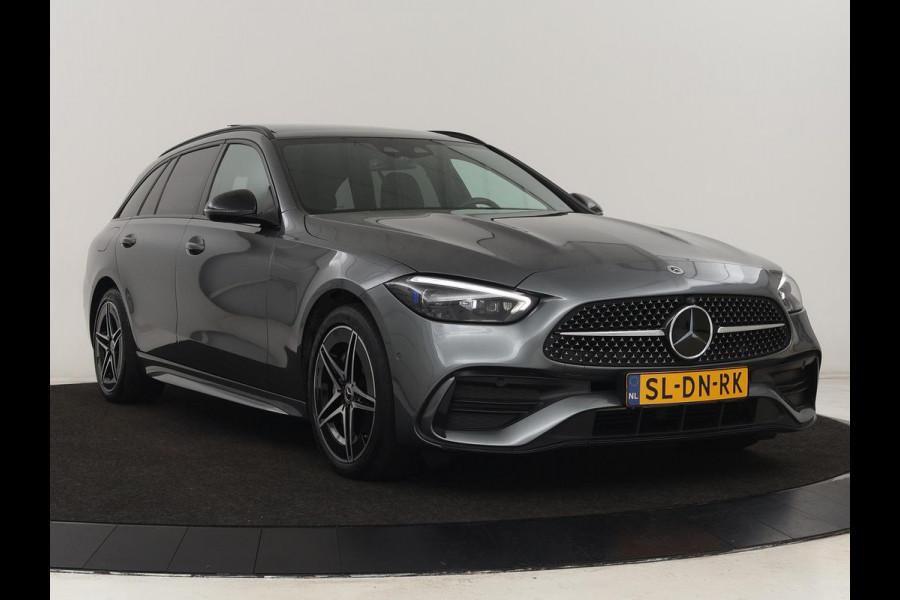 Mercedes-Benz C-Klasse 300 e AMG Line | Panoramadak | Wegklapbare trekhaak | Sfeerverlichting | Elektrische stoelen | Stoelverwarming | 360 Camera | Leder | Memory | Carplay