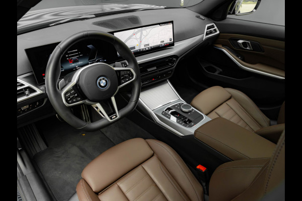 BMW 3 Serie Touring 330e M-Sport - Pano - LCI 2 - ACC - Trekhaak - Widescreen - Hifi