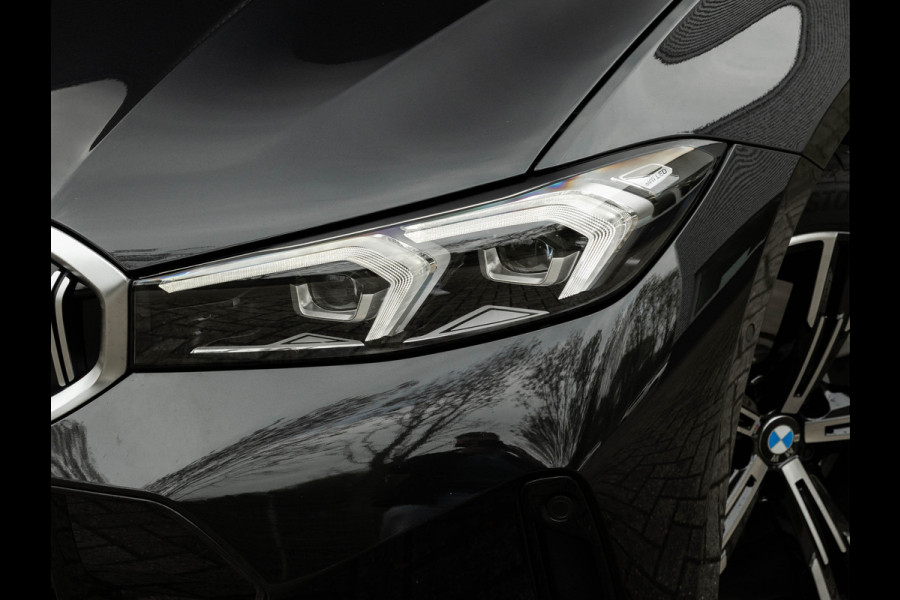 BMW 3 Serie Touring 330e M-Sport - Pano - LCI 2 - ACC - Trekhaak - Widescreen - Hifi