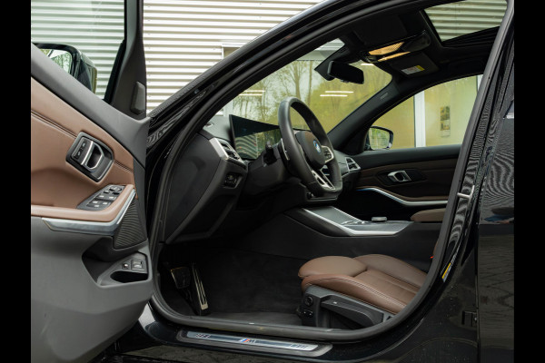 BMW 3 Serie Touring 330e M-Sport - Pano - LCI 2 - ACC - Trekhaak - Widescreen - Hifi
