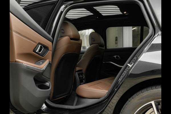 BMW 3 Serie Touring 330e M-Sport - Pano - LCI 2 - ACC - Trekhaak - Widescreen - Hifi