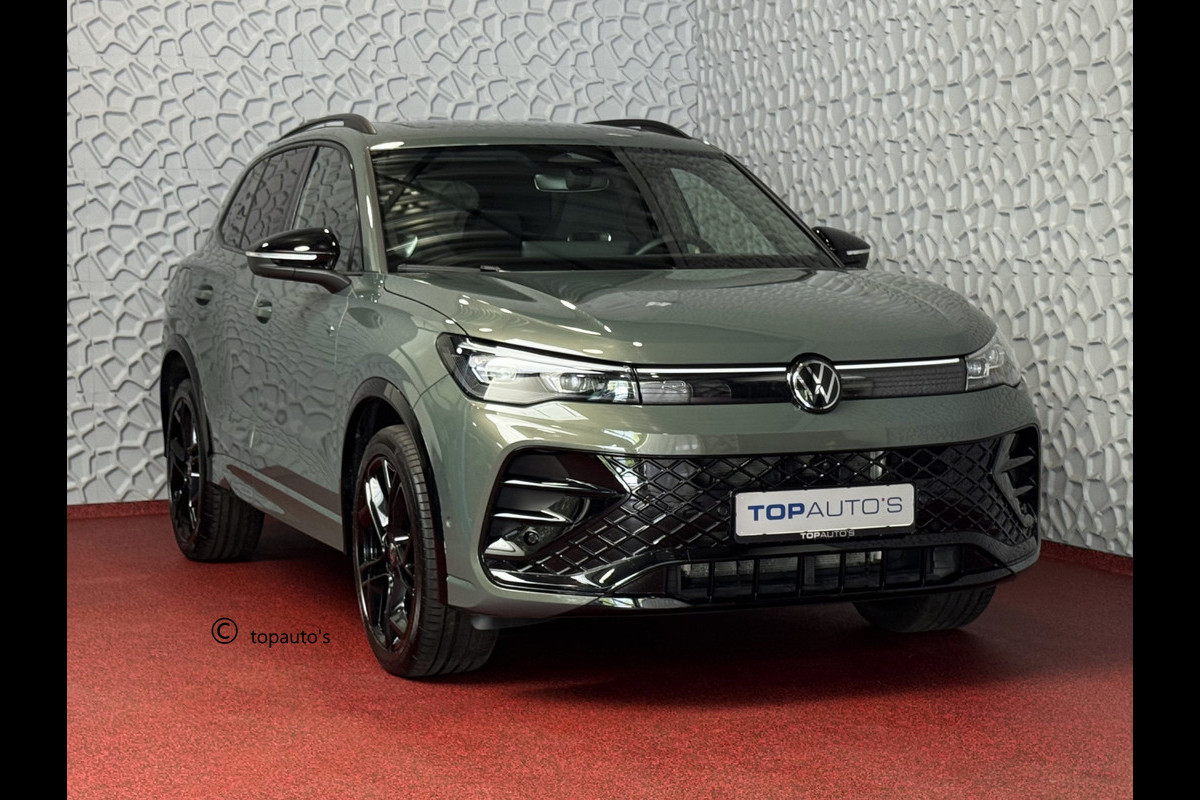 Volkswagen Tiguan 1.5 eHYBRID 272PK R-LINE PANO XL.NAVI TREKHAAK BLACK.STYLE 360.CAM ELEK.KLEP MATRIX.LED 20''LMV MASSAGE PHEV PLUG IN HYBRID Harman-Kardon "Volkswagen rijden begint bij Topautos.nl – 75 topmodellen direct op voorraad!" Volkswagen Tiguan 1.5 eHYBRID 272PK R-LINE PANO XL.NAVI TREKHAAK BLACK.STYLE 360.CAM ELEK.KLEP MATRIX.LED 20''LMV MASSAGE PHEV PLUG IN HYBRID Harman-Kardon "Volkswagen rijden begint bij Topautos.nl – 75 topmodellen direct op voorraad!"