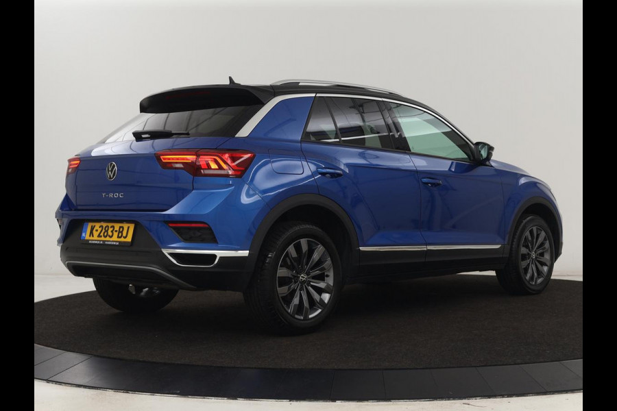 Volkswagen T-Roc 1.5 TSI Sport | Panoramadak | Carplay | Adaptive cruise | Camera | Afneembare Trekhaak | Navigatie | Active Info Display Volkswagen T-Roc 1.5 TSI Sport | Panoramadak | Carplay | Adaptive cruise | Camera | Afneembare Trekhaak | Navigatie | Active Info Display